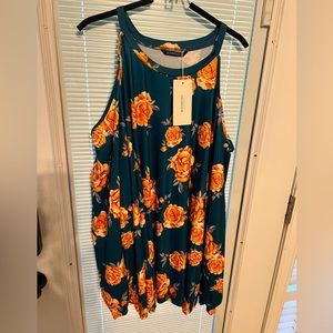 NWT, Cold shoulder, long sleeve flower print top.